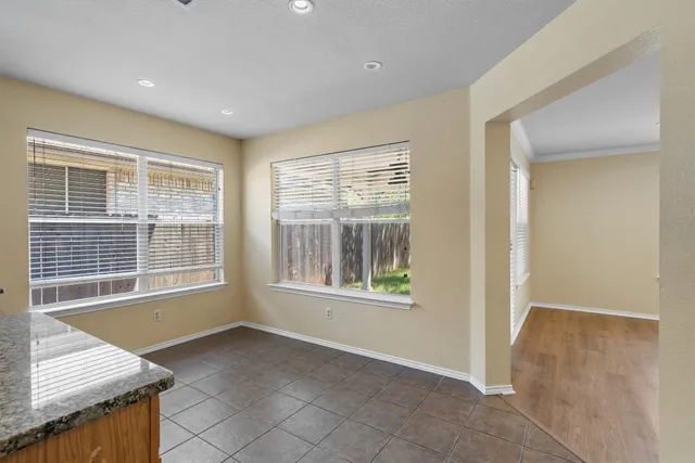 an empty room with windows