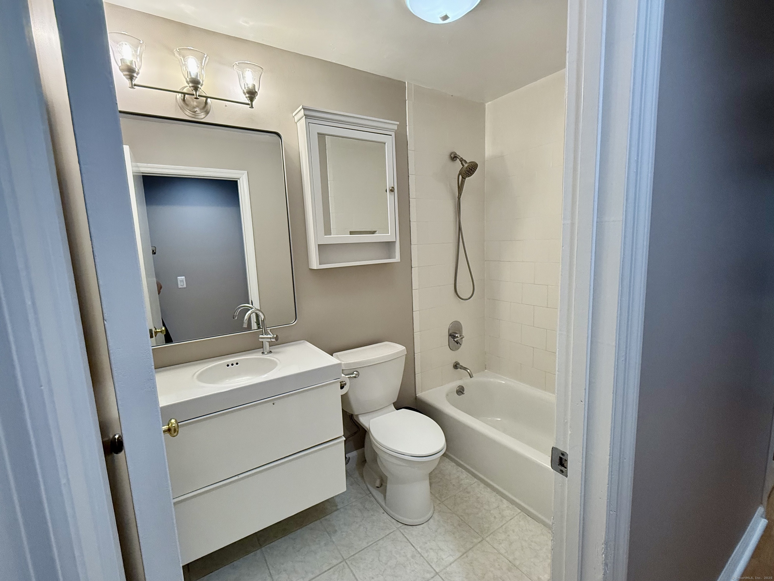 34 Nature View Trail, Unit 34 Bethel, CT 06801 - Photo 11 of 19 a bathroom with a toilet a sink and shower