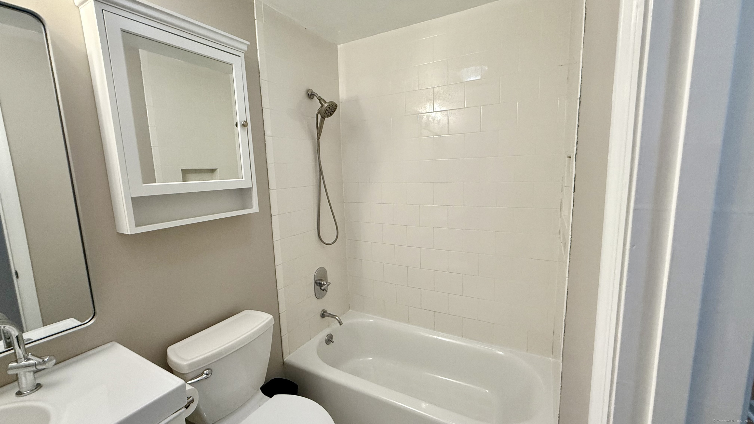 34 Nature View Trail, Unit 34 Bethel, CT 06801 - Photo 12 of 19 a bathroom with a granite countertop bathtub shower sink vanity and toilet