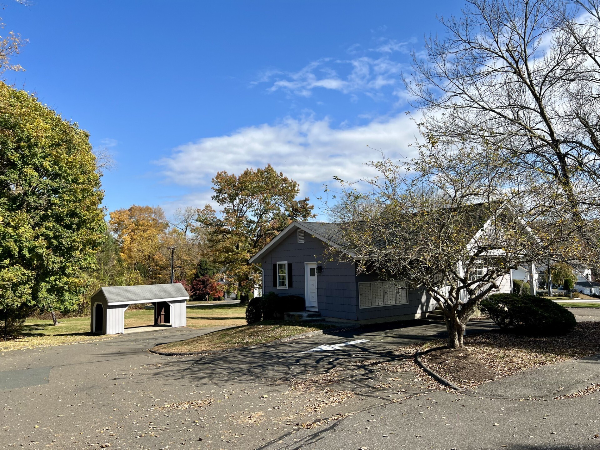 34 Nature View Trail, Unit 34 Bethel, CT 06801 - Photo 18 of 19 a front view of a house with a yard and garage