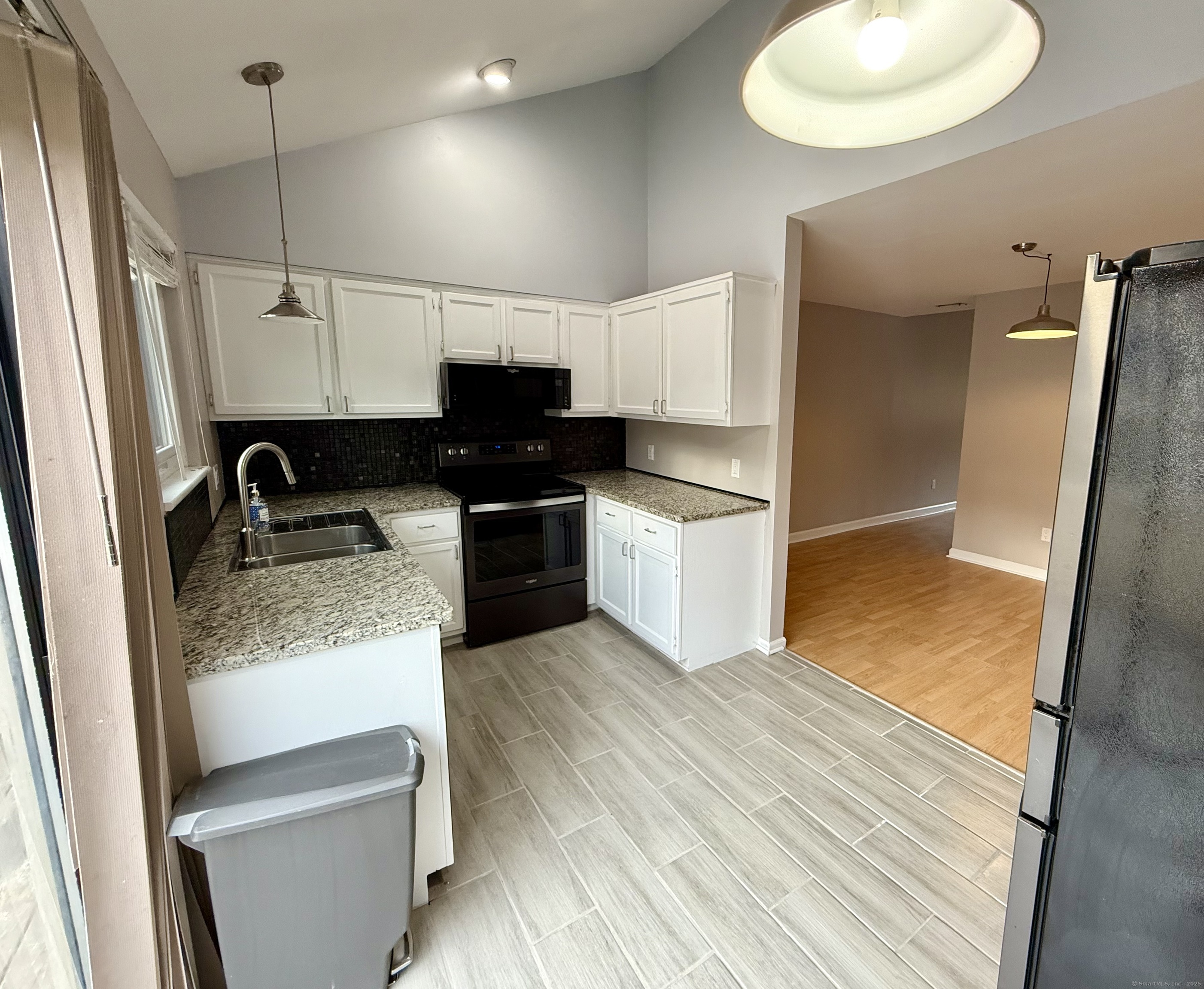 34 Nature View Trail, Unit 34 Bethel, CT 06801 - Photo 5 of 19 a kitchen with a sink stainless steel appliances and cabinets