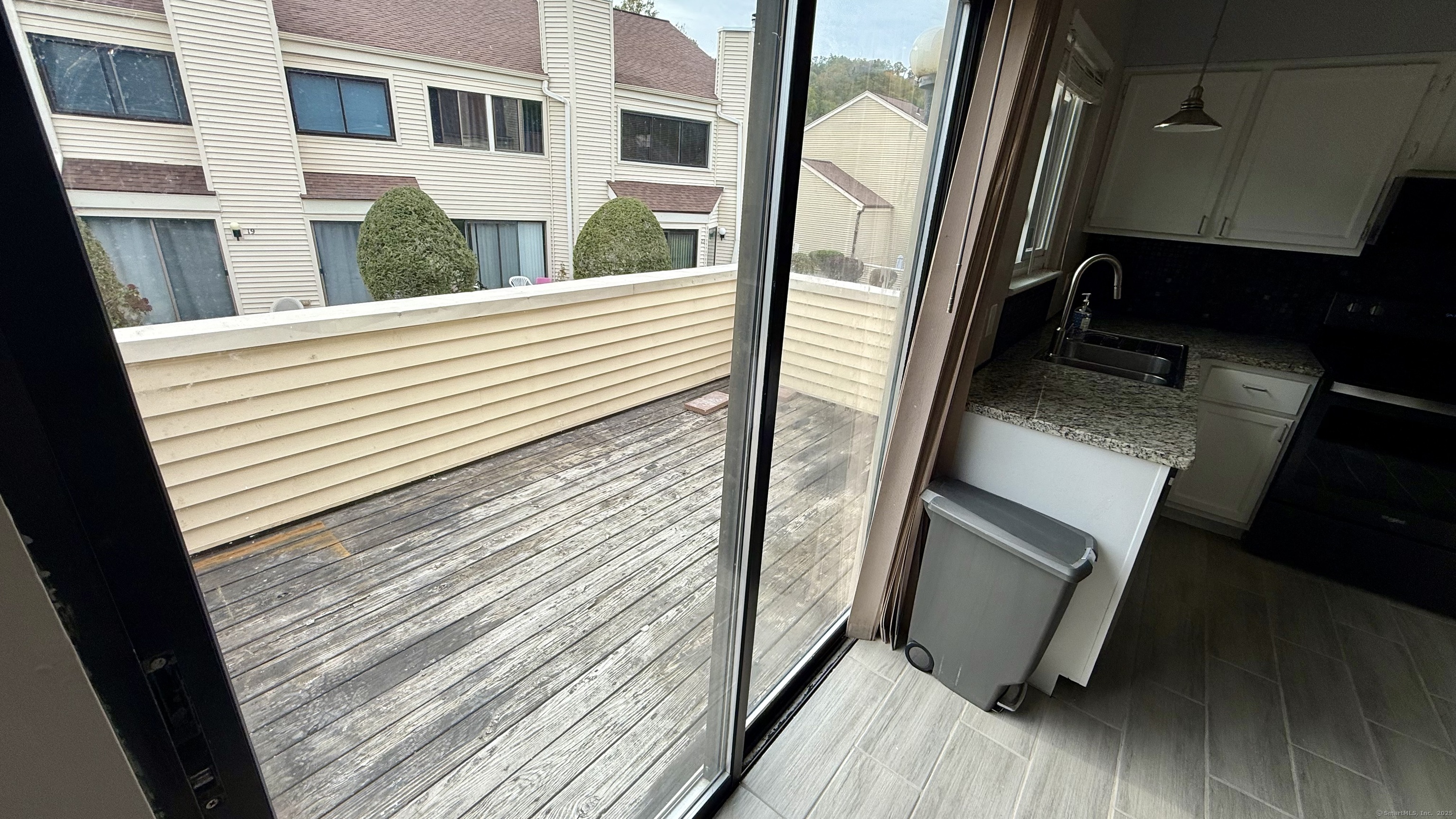 34 Nature View Trail, Unit 34 Bethel, CT 06801 - Photo 6 of 19 a view of a balcony with wooden floor
