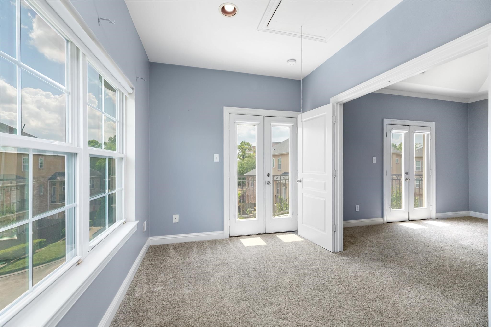 53 Versante Court Houston, TX 77070 - Photo 15 of 30 a view of an empty room with glass door and balcony