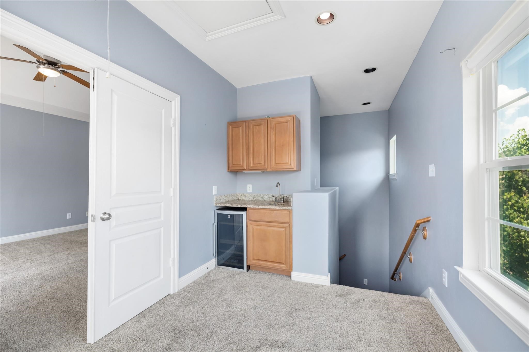 53 Versante Court Houston, TX 77070 - Photo 16 of 30 a room with window and a fireplace