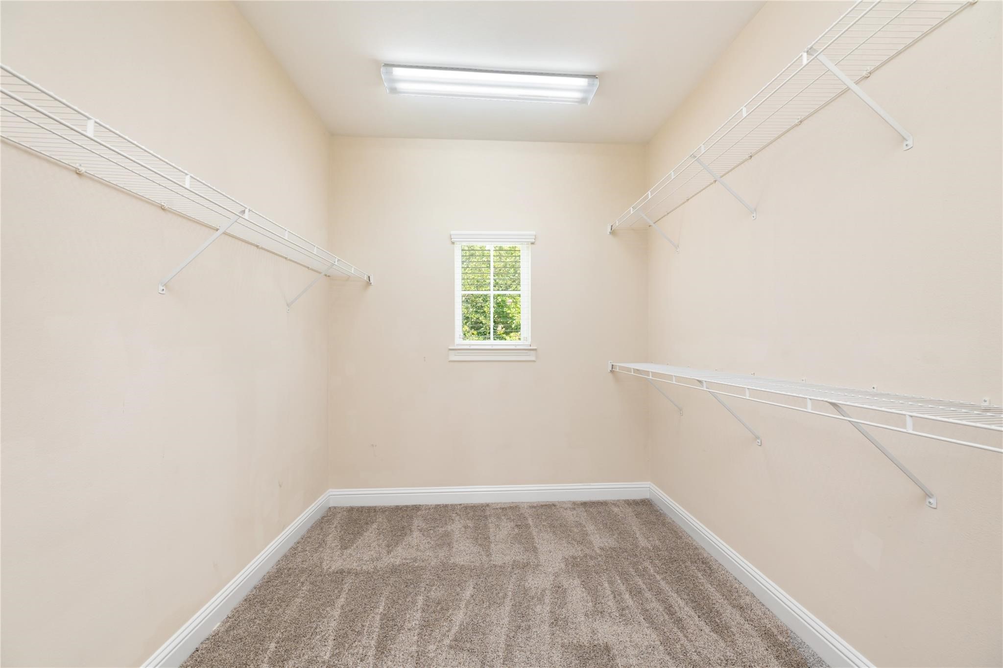 53 Versante Court Houston, TX 77070 - Photo 20 of 30 a view of a room that has a window