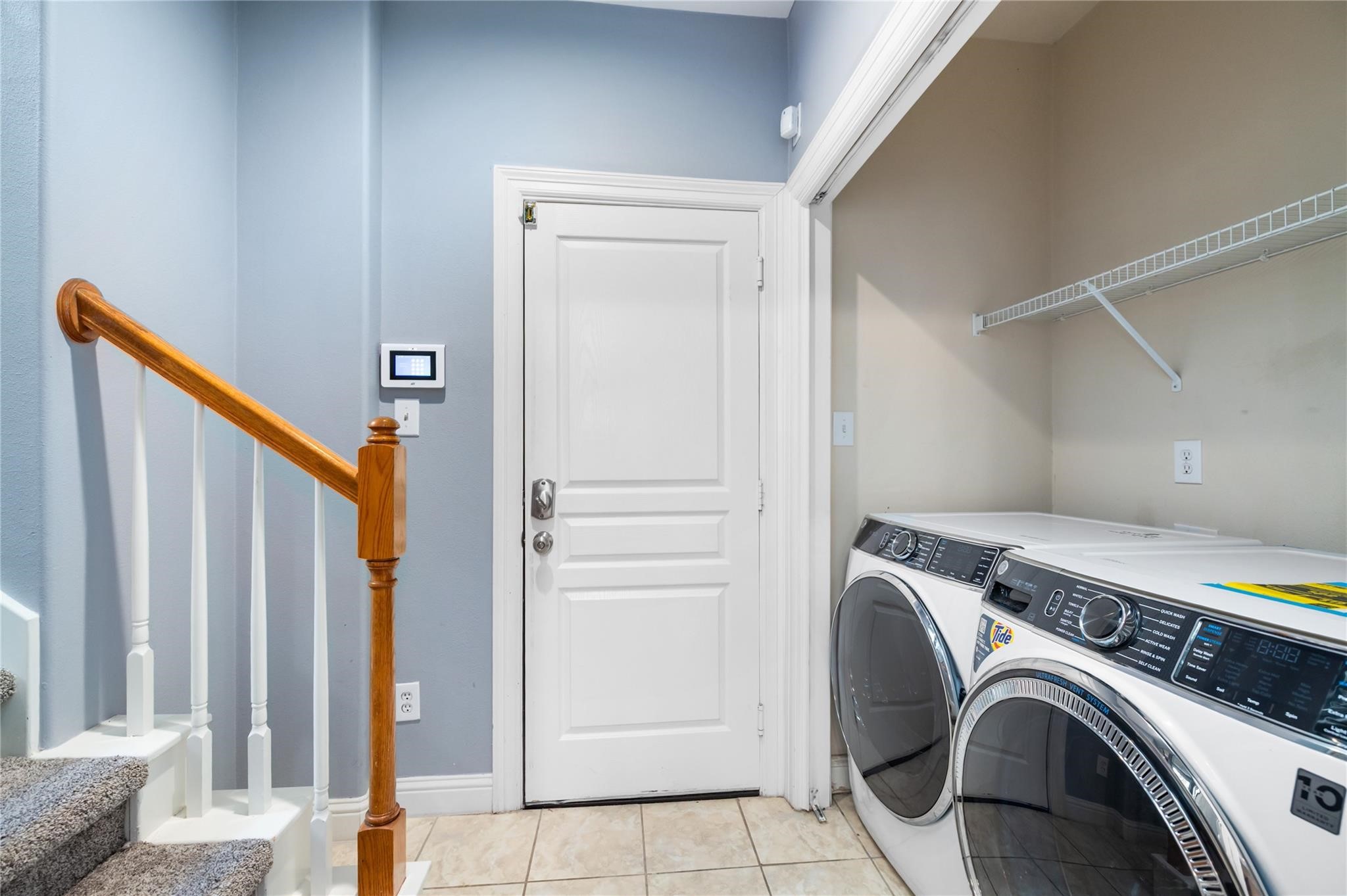 53 Versante Court Houston, TX 77070 - Photo 24 of 30 a view of storage and utility room with washer and dryer