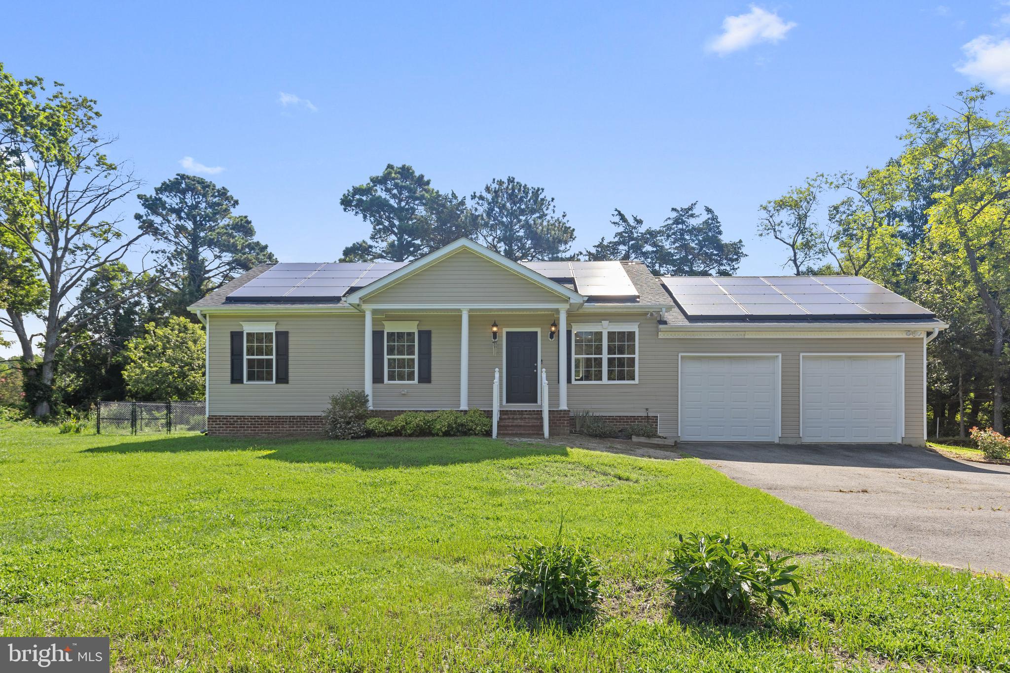 16665 Three Notch Road Ridge, MD 20680 - Photo 1 of 38 a front view of house with yard and green space