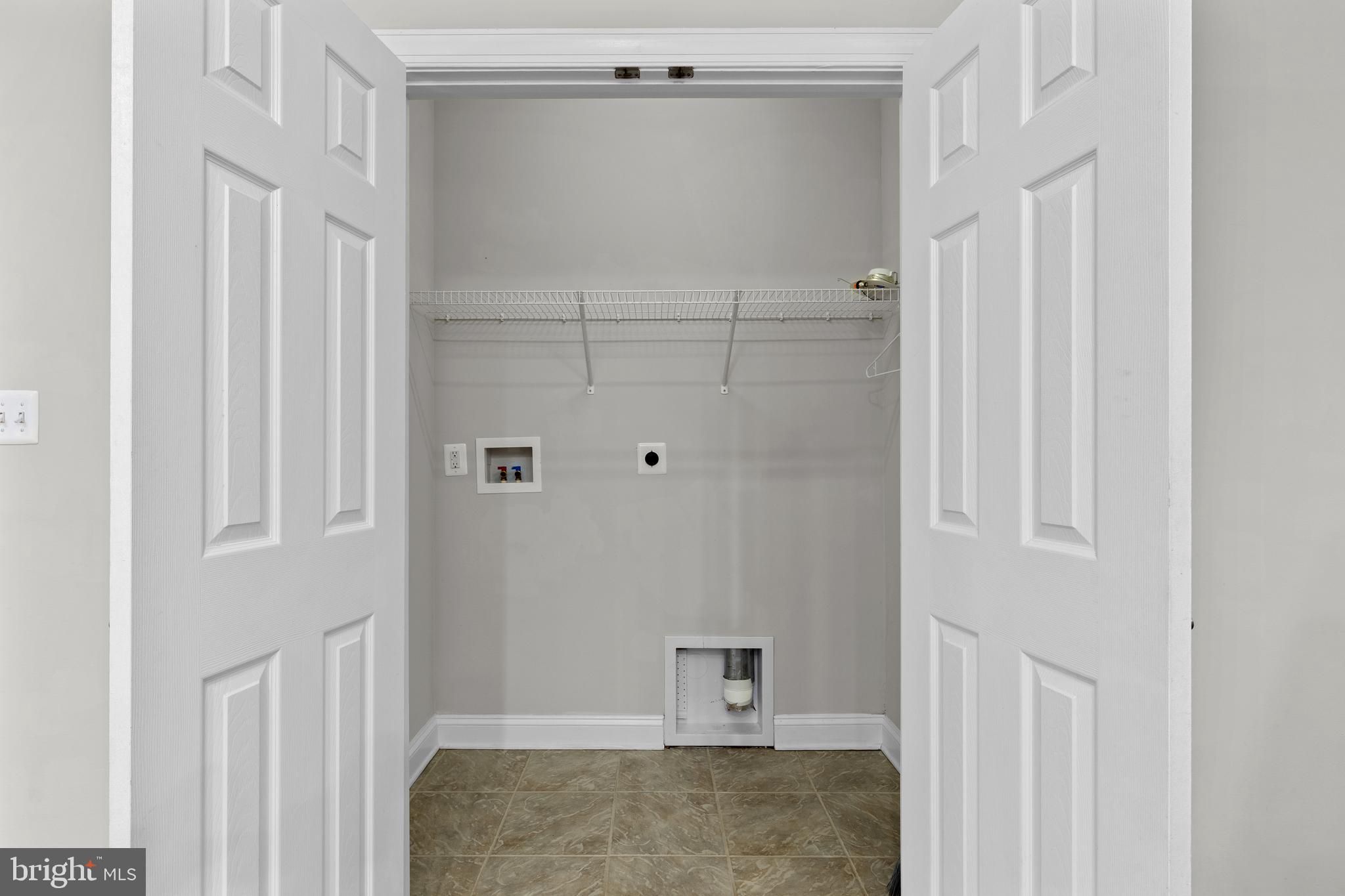 16665 Three Notch Road Ridge, MD 20680 - Photo 15 of 38 a bathroom with a granite countertop shower