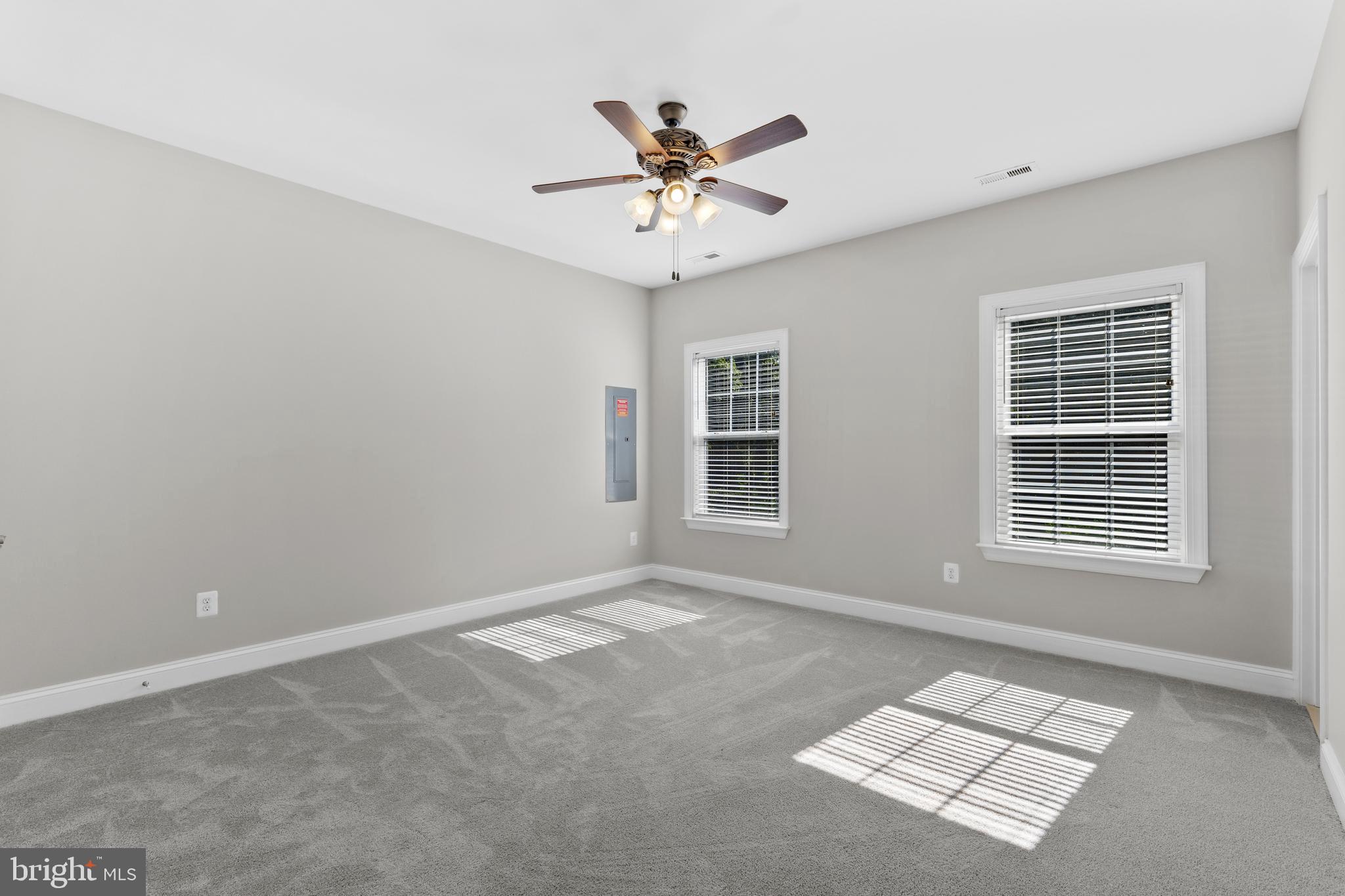16665 Three Notch Road Ridge, MD 20680 - Photo 17 of 38 a view of an empty room with a window
