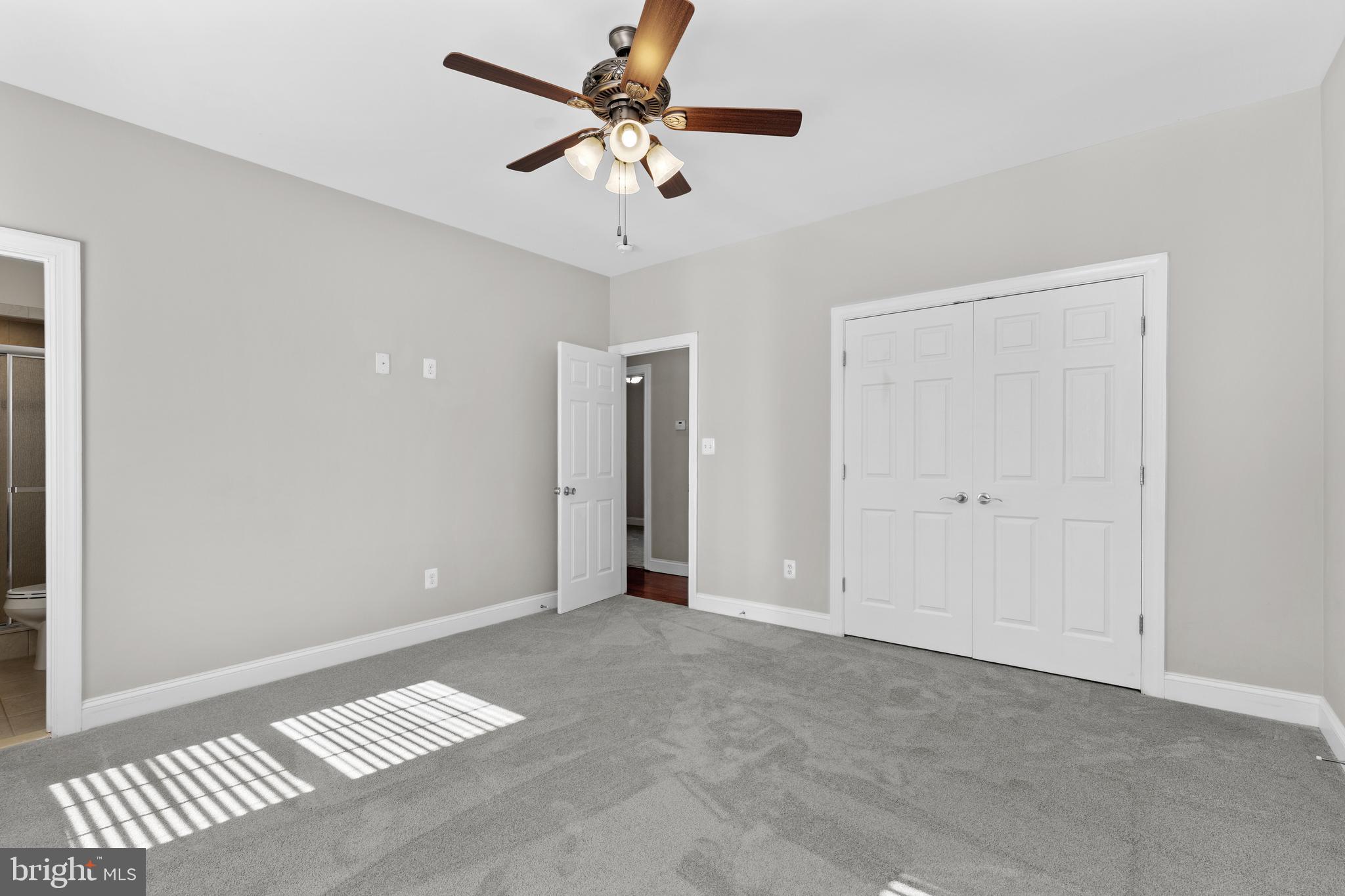 16665 Three Notch Road Ridge, MD 20680 - Photo 18 of 38 a view of an empty room with a window