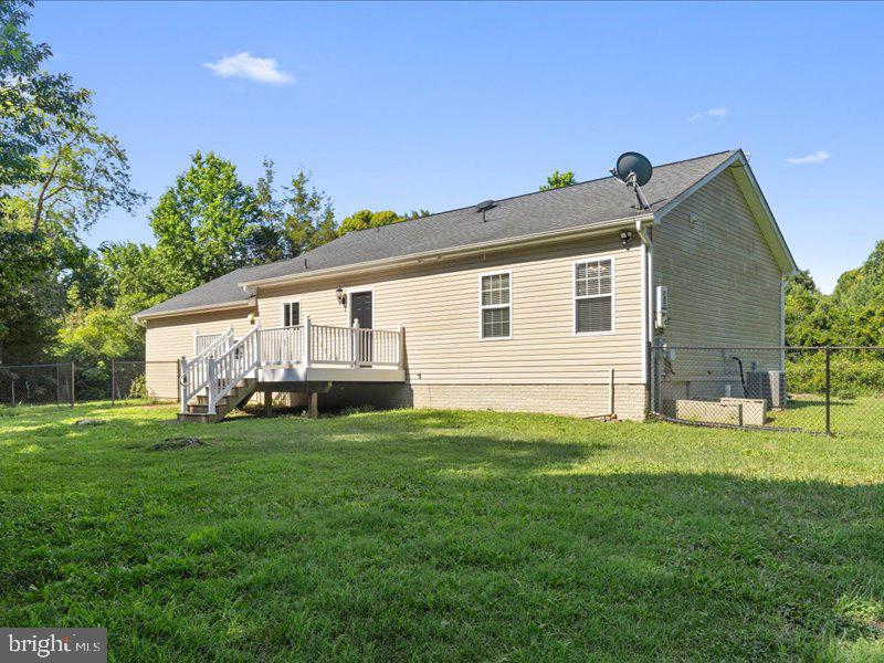16665 Three Notch Road Ridge, MD 20680 - Photo 34 of 38 a view of a backyard of the house