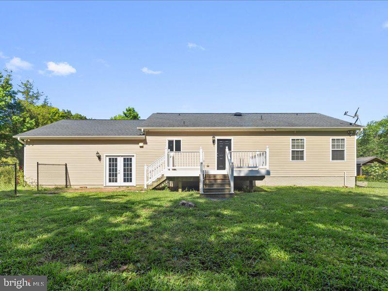 16665 Three Notch Road Ridge, MD 20680 - Photo 35 of 38 a house view with a sitting space and garden