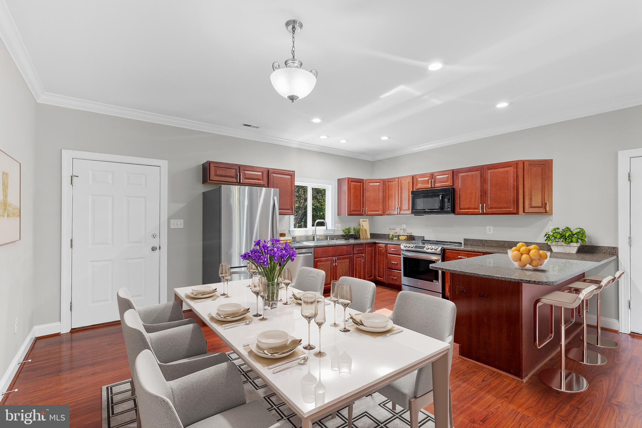 16665 Three Notch Road Ridge, MD 20680 - Photo 10 of 38 a view of a dining room with furniture