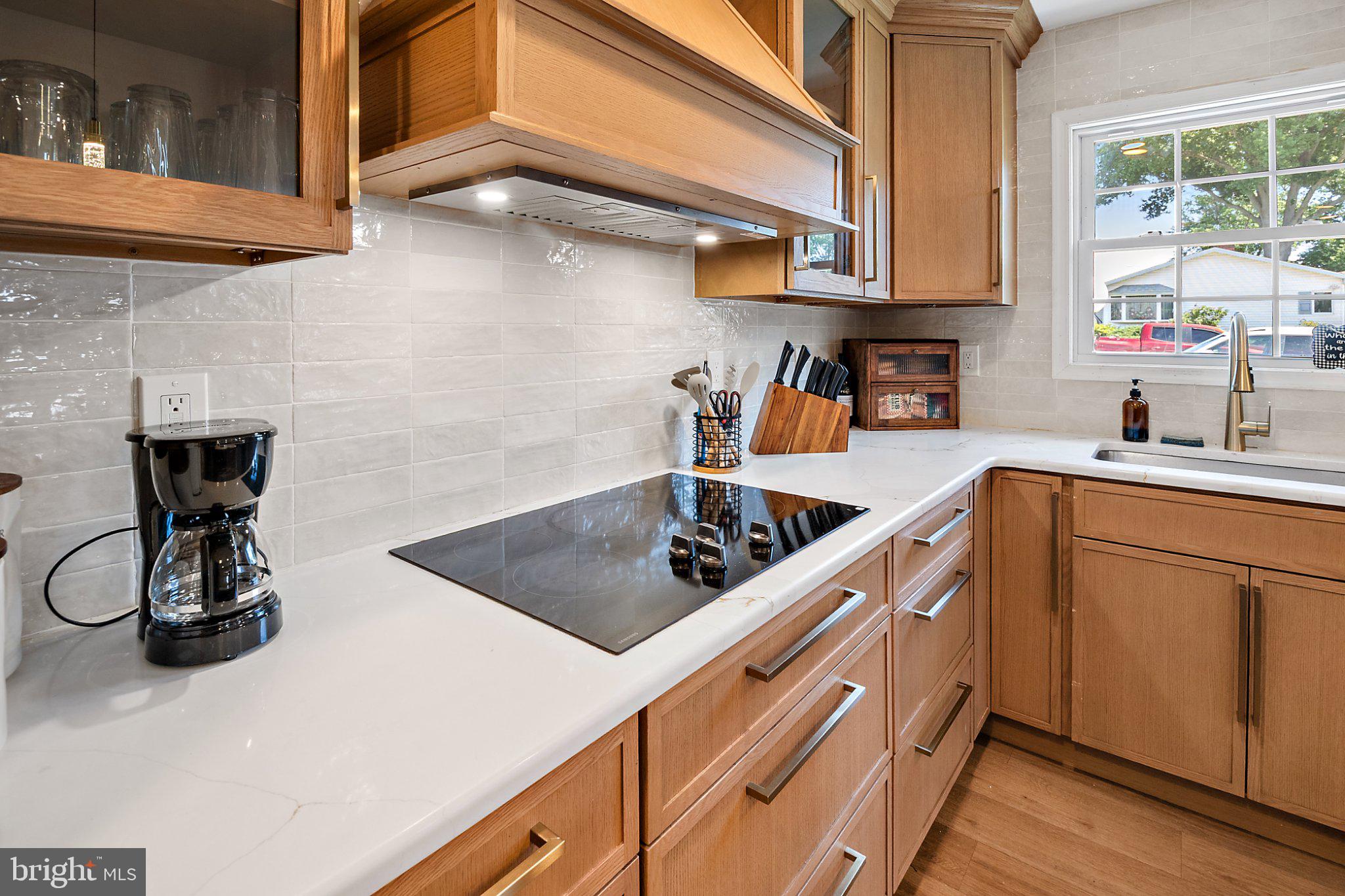 56 Gridiron Road Levittown, PA 19057 - Photo 12 of 35 Modern kitchen with warm wood tones.