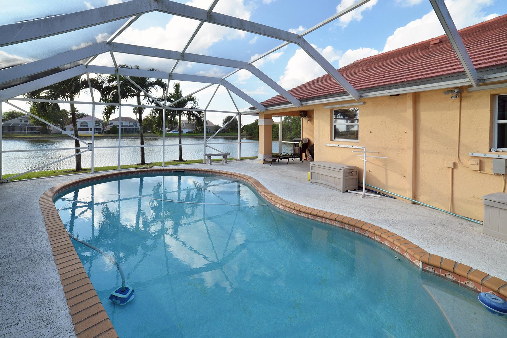 10684 Plainview Circle Boca Raton, FL 33498 - Photo 5 of 22 Screened in Pool Overlooking the Lake