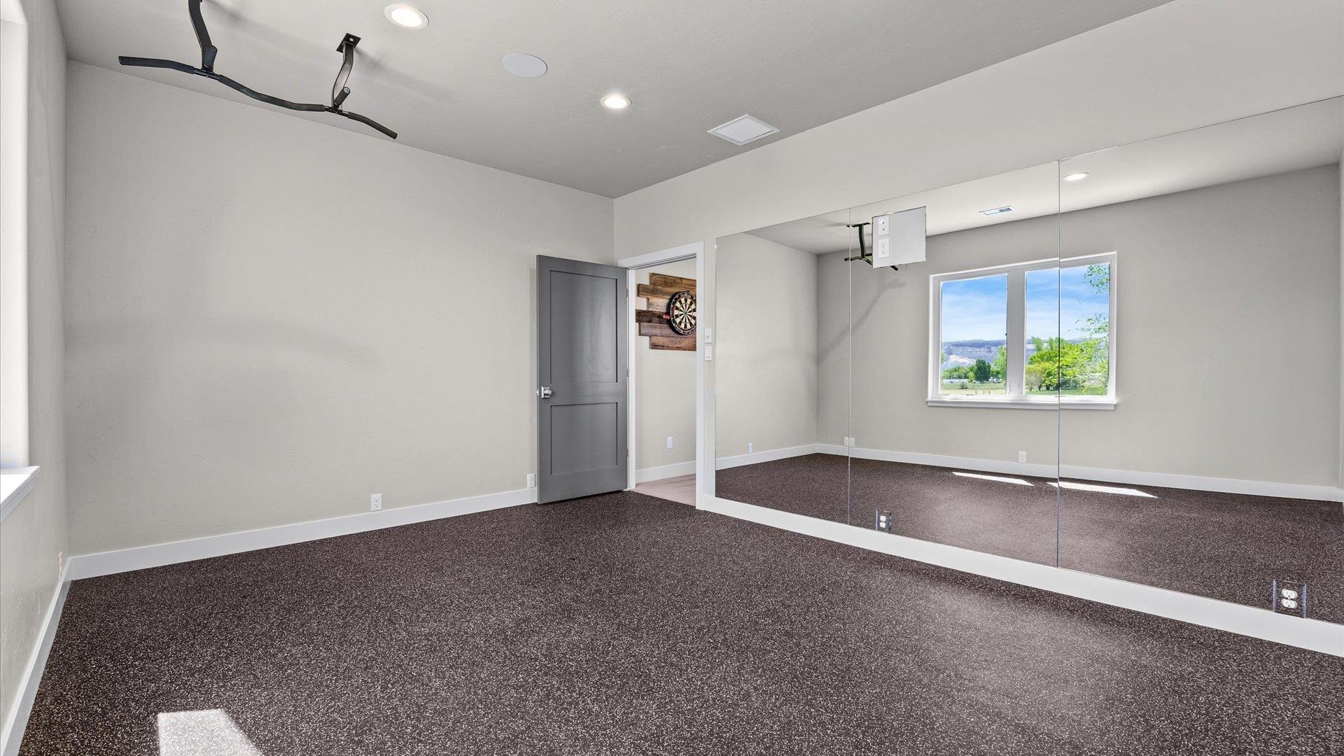 2041 J J 1/2 Road Fruita, CO 81521 - Photo 23 of 42 a view of an empty room with a window