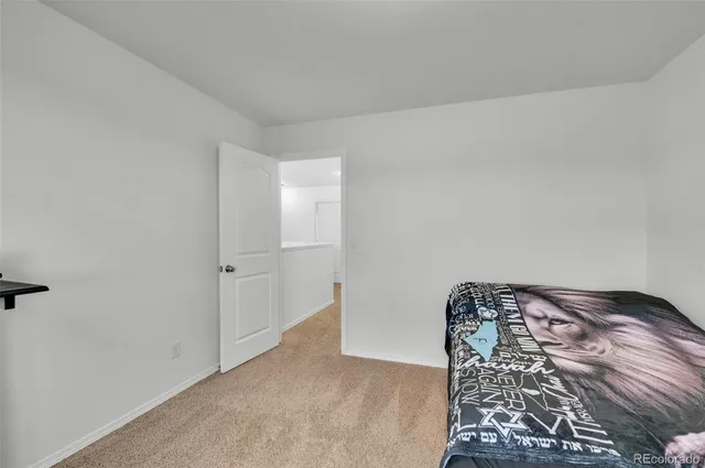 a view of bedroom with a bed