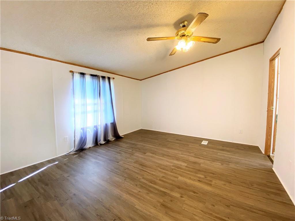 275 Reginald Road Mayodan, NC 27027 - Photo 13 of 43 Primary bedroom