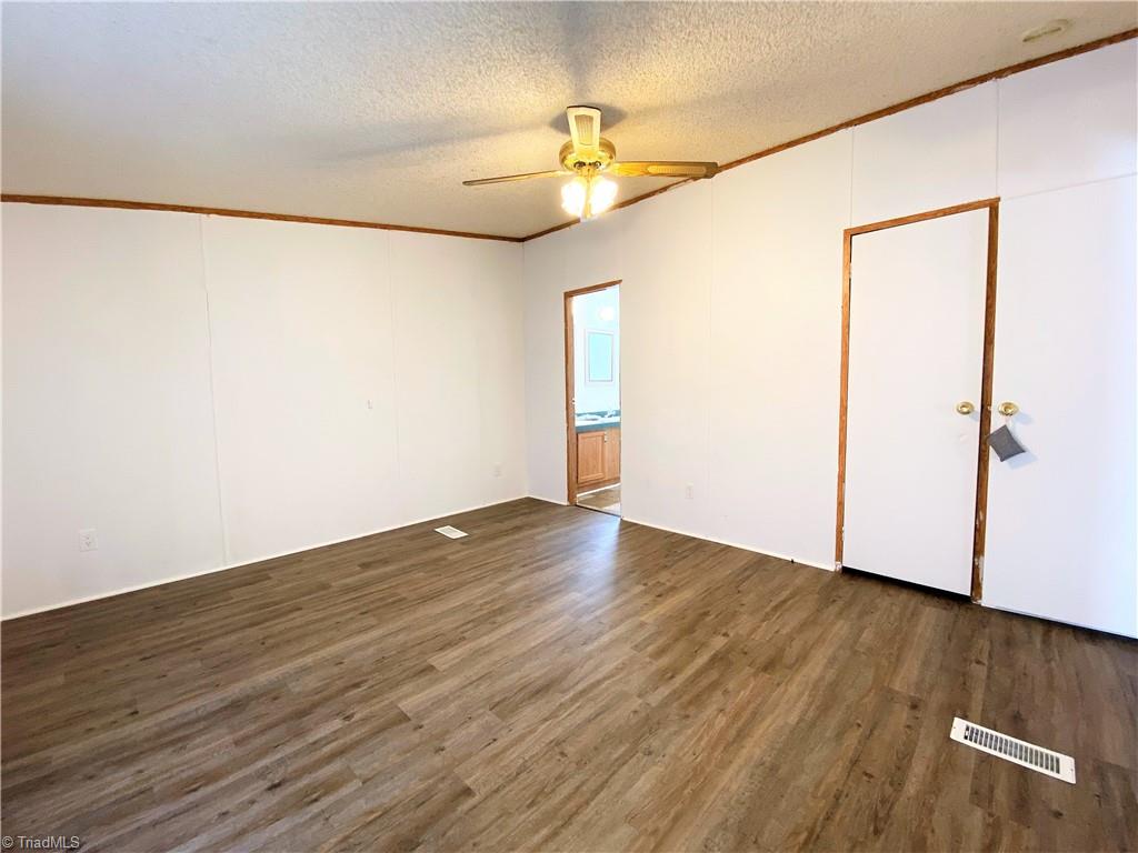 275 Reginald Road Mayodan, NC 27027 - Photo 14 of 43 Primary bedroom