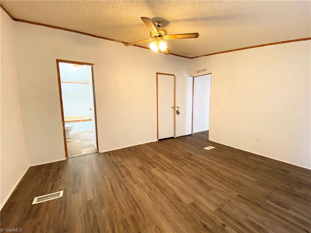 275 Reginald Road Mayodan, NC 27027 - Photo 15 of 43 Primary bedroom