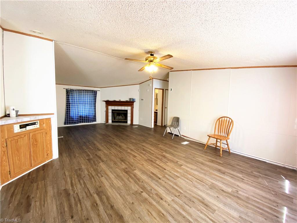 275 Reginald Road Mayodan, NC 27027 - Photo 4 of 43 Living room open to Den