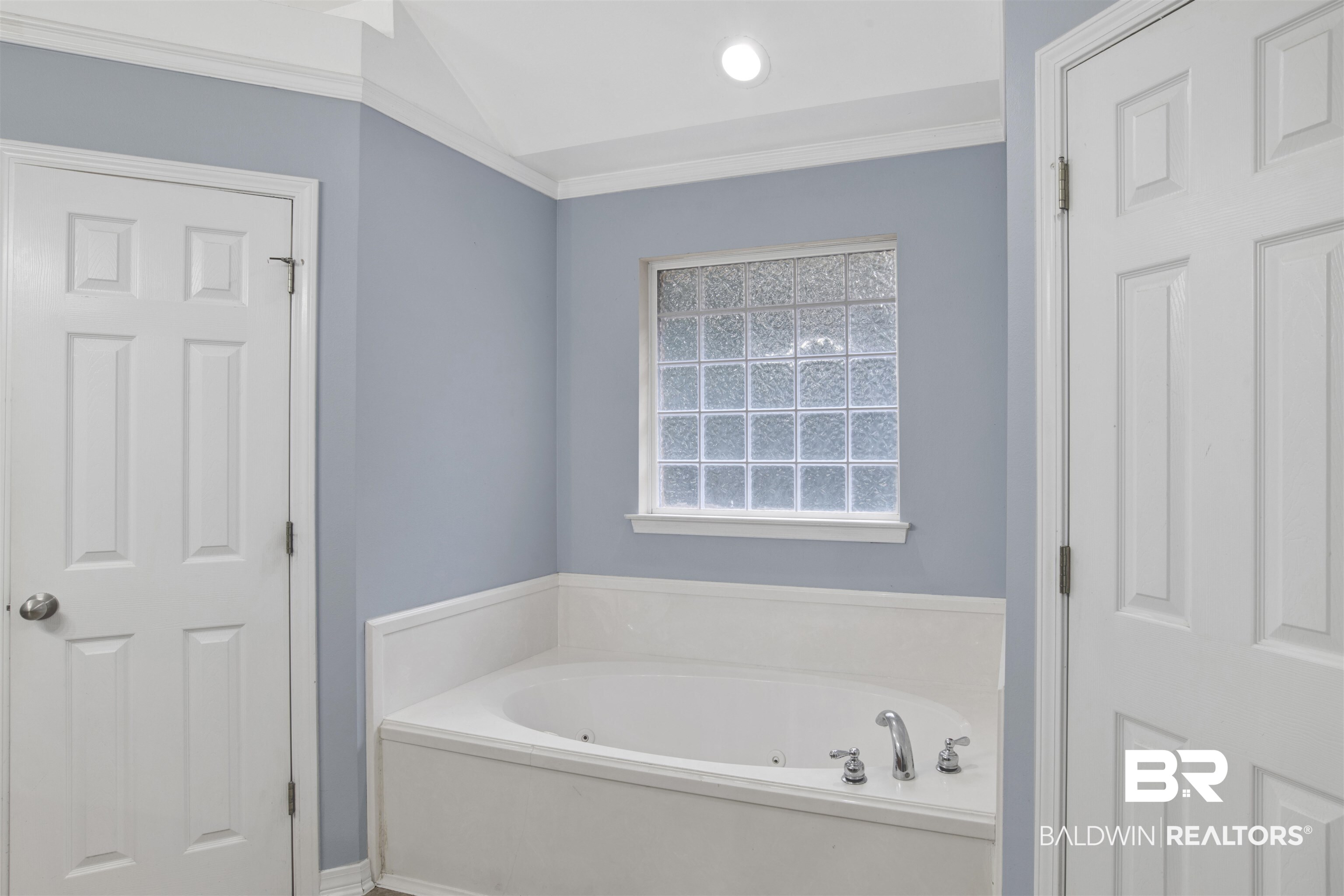 9534 Labrador Run North Mobile, AL 36695 - Photo 24 of 30 Bathroom with a tub with jets, ornamental molding, and recessed lighting