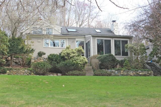 86 Lyons Plain Road Weston, CT 06883 - Photo 1 of 1 Many windows face the river in this charming home.