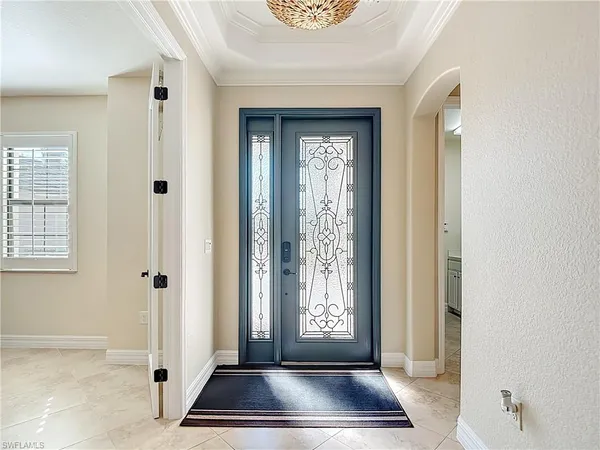 a view of a livingroom with wooden floor and a window