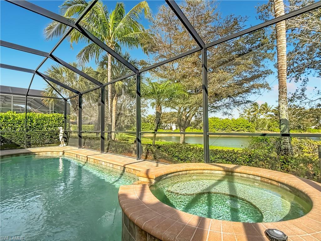 9250 Veneto Place Naples, FL 34113 - Photo 48 of 50 a view of swimming pool with a patio