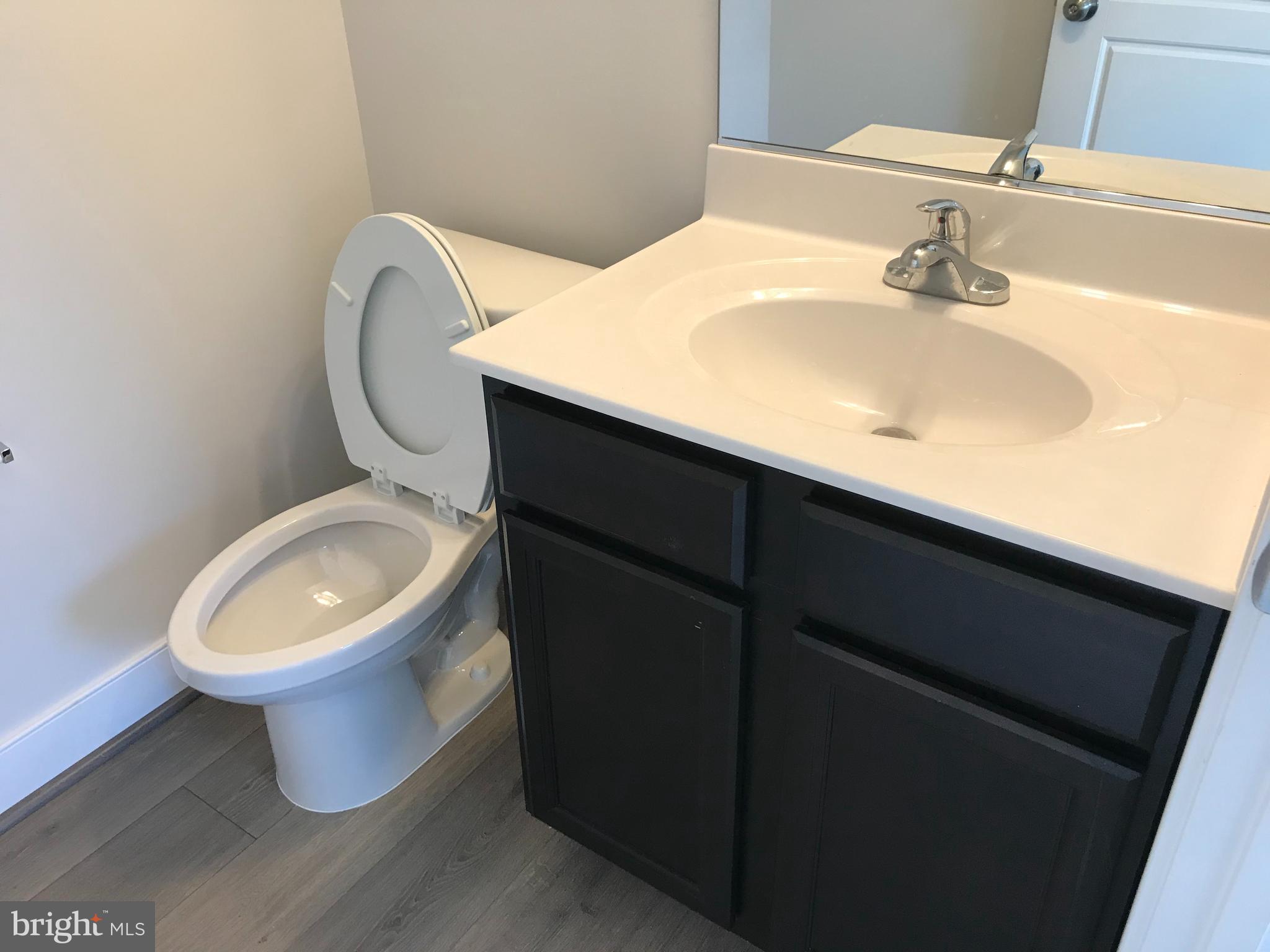 14227 Travilah Road Rockville, MD 20850 - Photo 4 of 20 Half bathroom in first floor