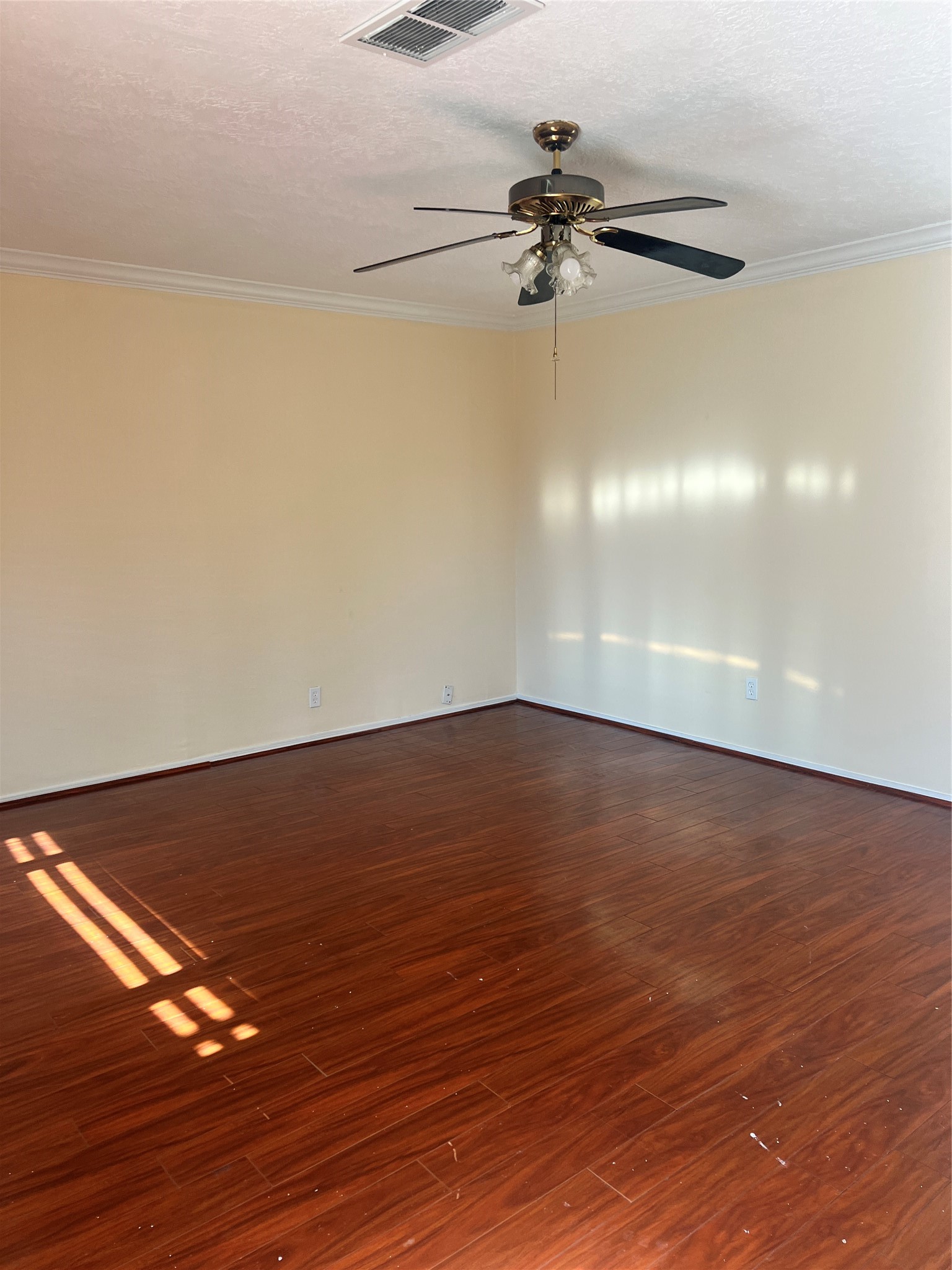 5604 Chapman Street Houston, TX 77009 - Photo 11 of 25 a view of a room with wooden floor