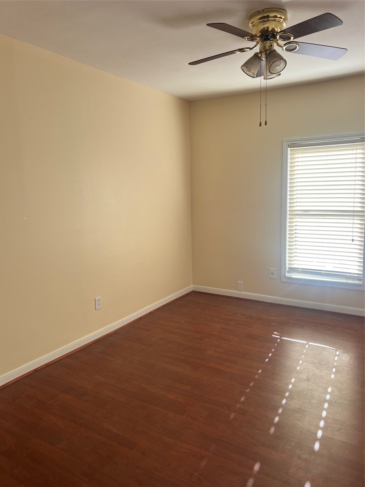 5604 Chapman Street Houston, TX 77009 - Photo 15 of 25 a view of an empty room with a window