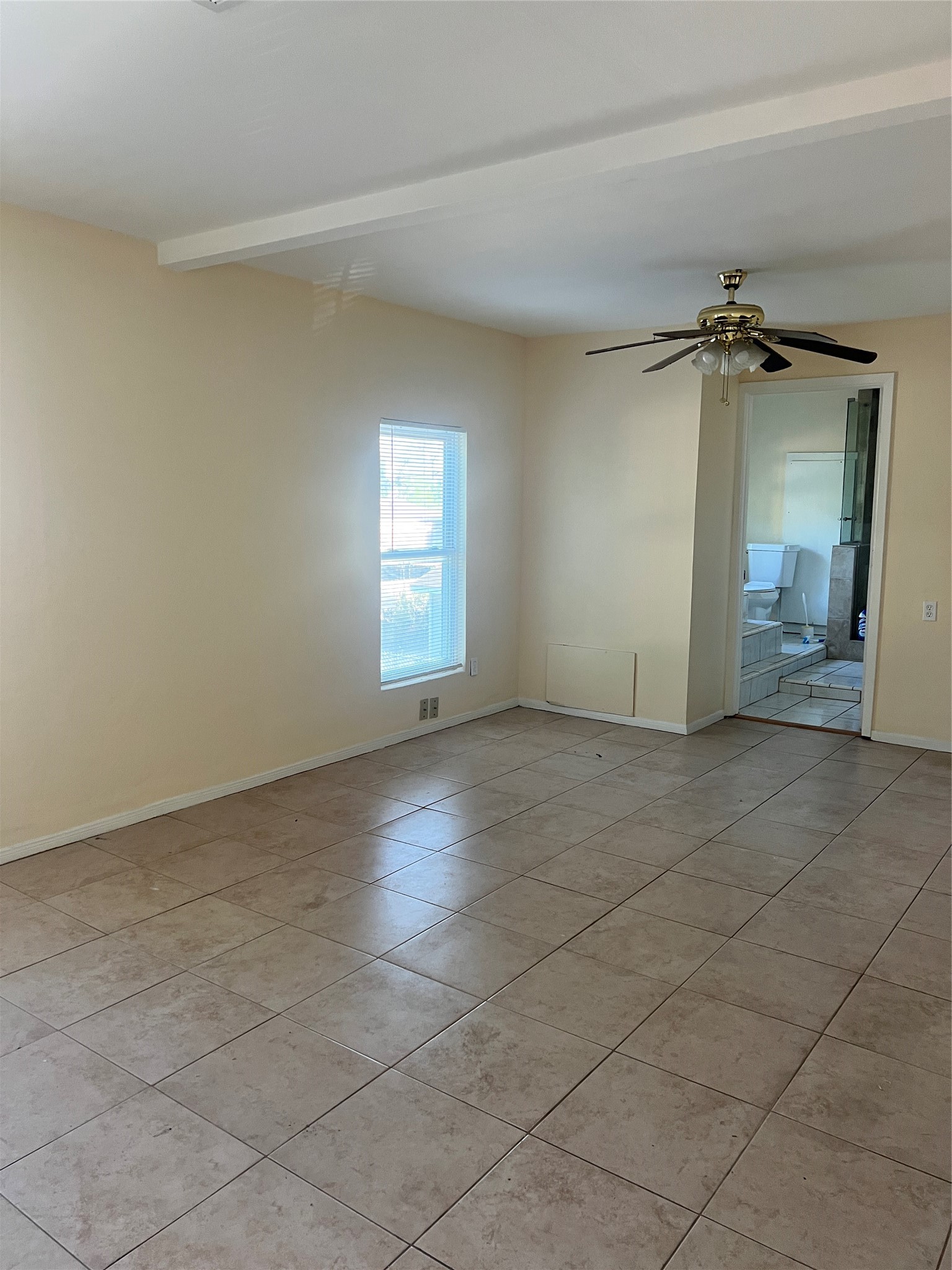 5604 Chapman Street Houston, TX 77009 - Photo 22 of 25 an empty room with a empty space and windows