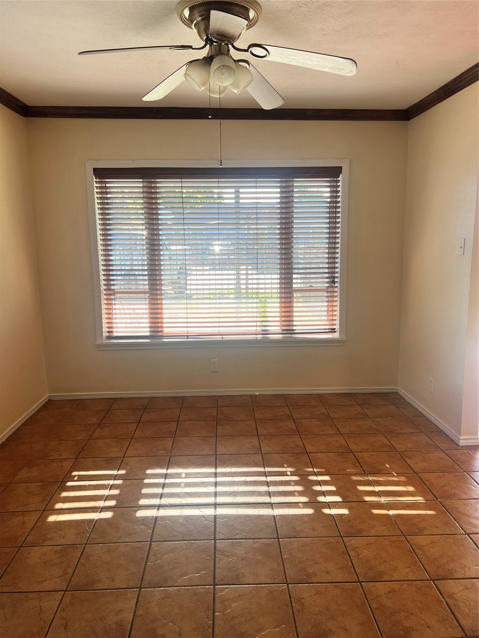 5604 Chapman Street Houston, TX 77009 - Photo 9 of 25 a view of an empty room with a window