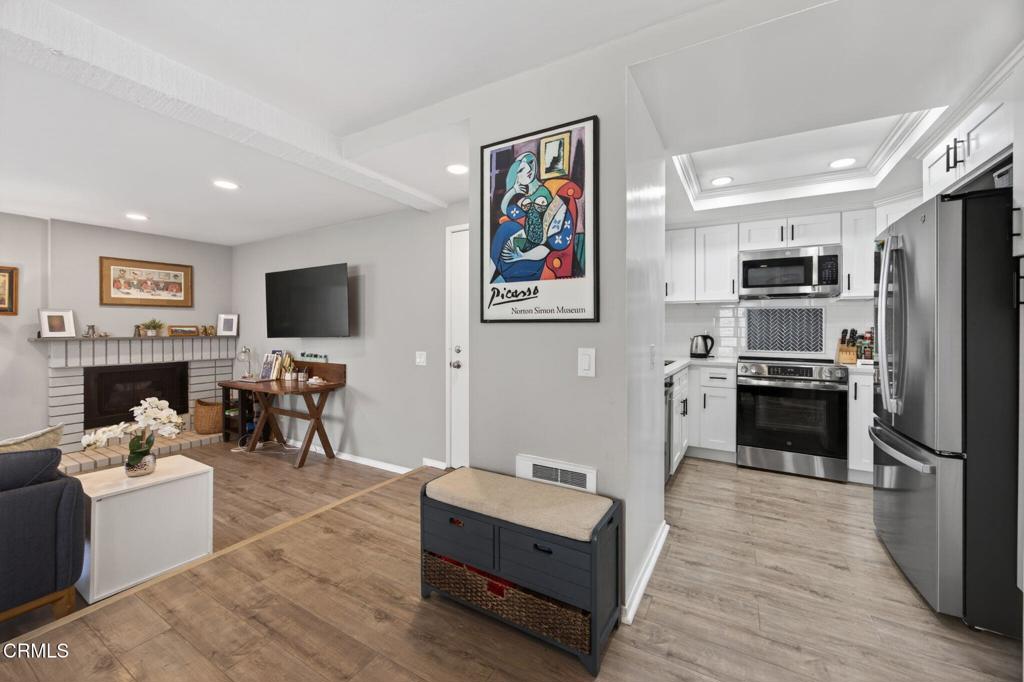 2955 Harbor Boulevard Oxnard, CA 93035 - Photo 11 of 41 a living room with furniture and a flat screen tv