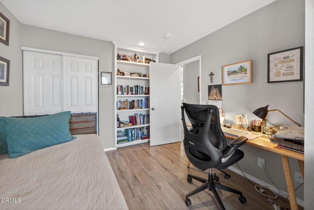 2955 Harbor Boulevard Oxnard, CA 93035 - Photo 19 of 41 a view of a workspace with furniture and a bookshelf