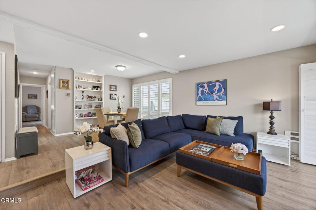 2955 Harbor Boulevard Oxnard, CA 93035 - Photo 3 of 41 a living room with furniture and a book shelf