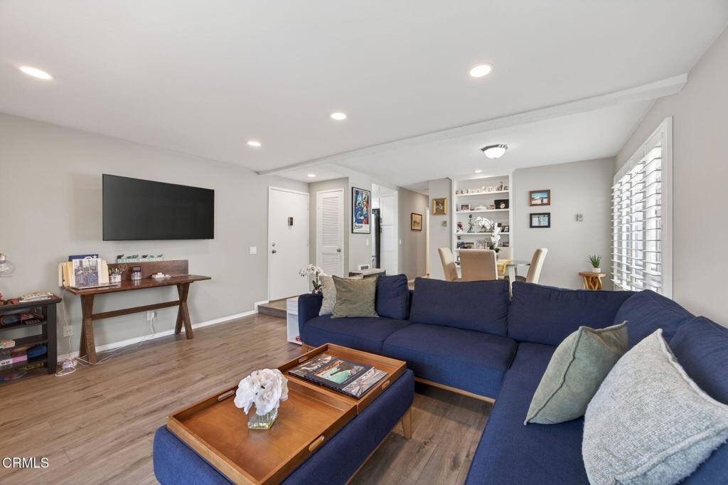 2955 Harbor Boulevard Oxnard, CA 93035 - Photo 9 of 41 a living room with furniture and a flat screen tv