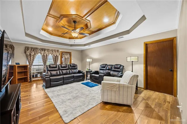 a living room with furniture and a rug