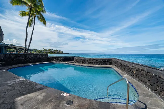 a view of a backyard of a house