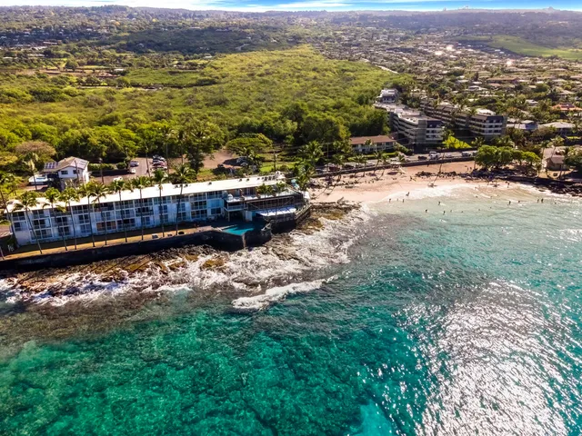 a view of a city with an ocean view