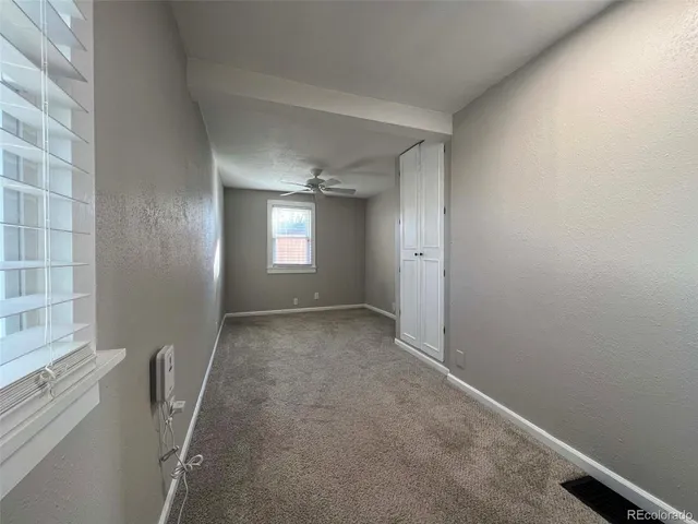 a view of a livingroom with a staircase