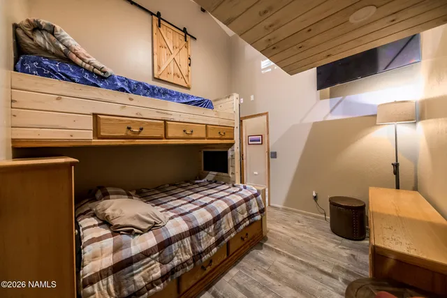 a vase of flowers sitting on a counter