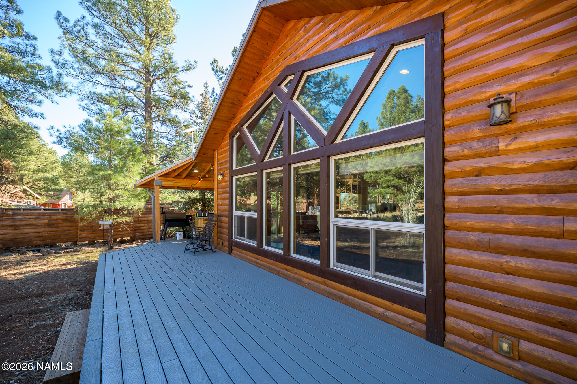 7042 East Robin Hood Road Williams, AZ 86046 - Photo 27 of 58 a view of outdoor space with deck and furniture