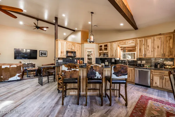 a view of a kitchen and utility room