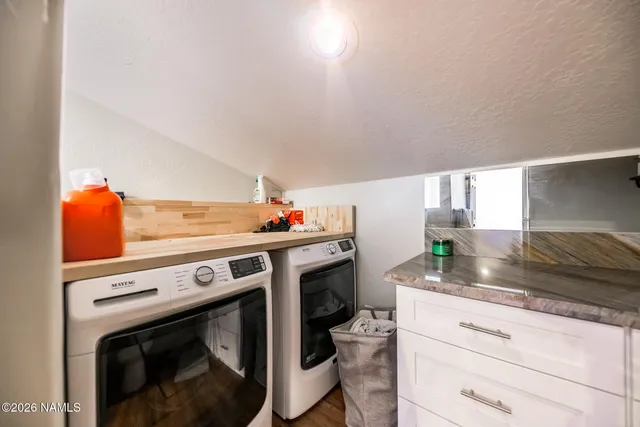 a view of a backyard with sitting area