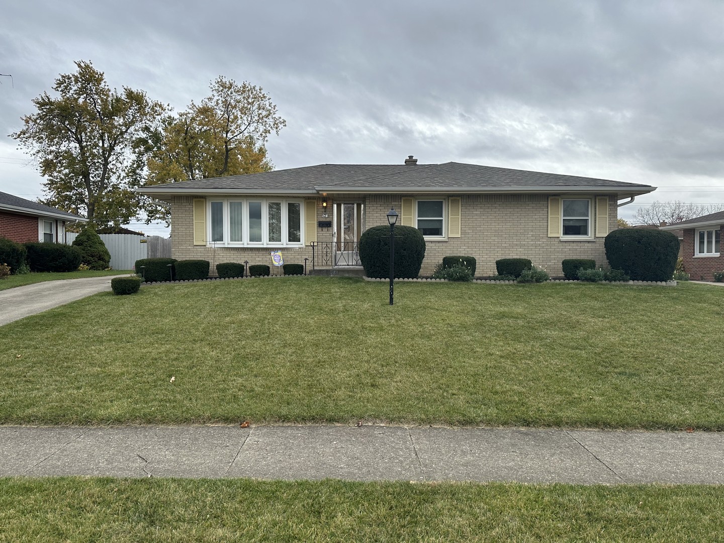 521 Chaney Avenue Crest Hill, IL 60403 - Photo 1 of 1 a view of a house with a yard and a garage