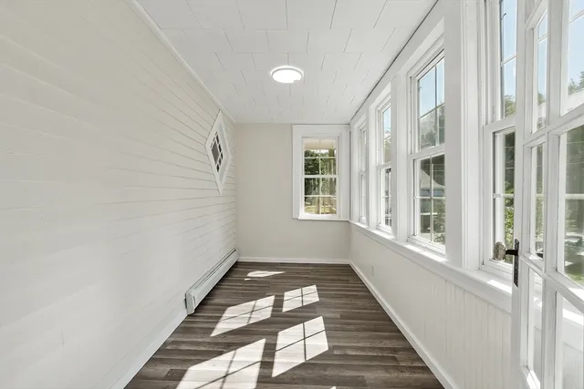 a view of a room with windows