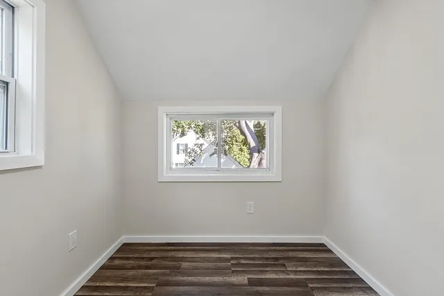 an empty room with window