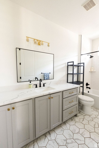 924 Country Lane Farmington, UT 84025 - Photo 37 of 91 Bathroom featuring a wide vanity with light grey cabinetry, gold hardware, and a white countertop
